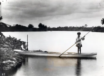 Seminole Indians in a Canoe